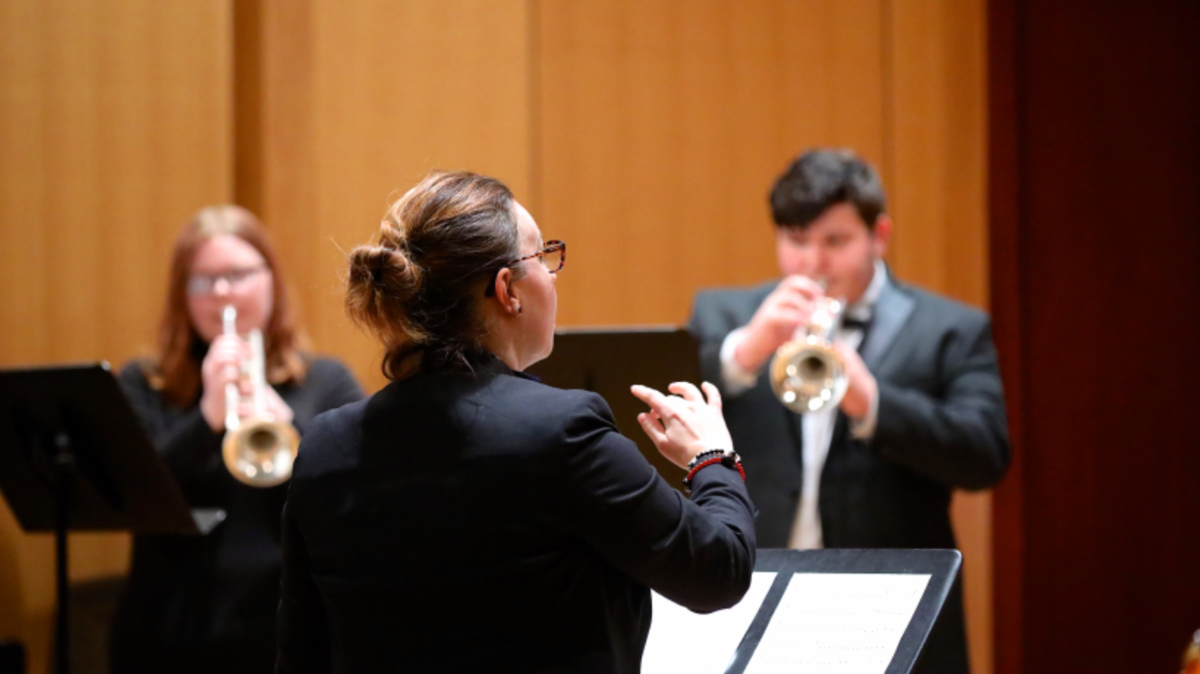 Lexie Conducting Trumpet Choir